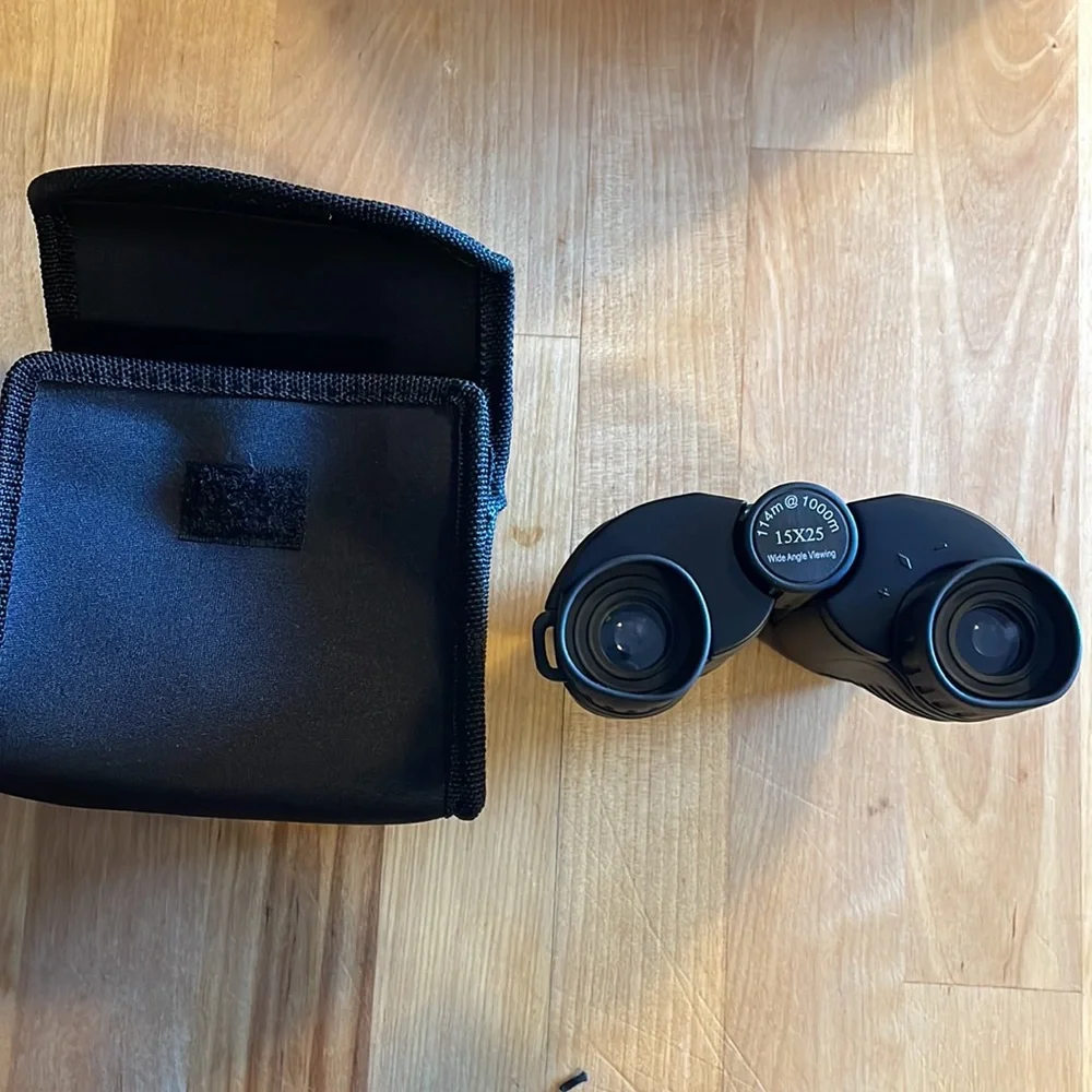 15x25 Binoculars. New. Great for hunting or sports.